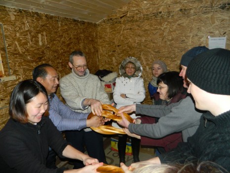 Dr. Rigdzin Dorje with students preparing ingredients for the composition
