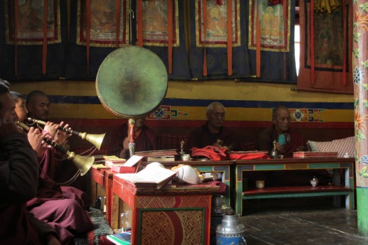 Kagyupa monks performing a puja praising Lord Naropa. Photo by Jamyang Oliphant