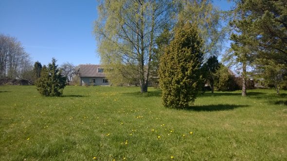 view to the farmhouse from the place of the Stupa of Victory