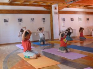 Children practising Kumar Kumari yantra yoga during the Yoga Holiday