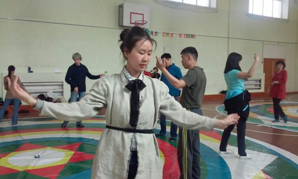 dancers on the mandala for vajra dance buryatia