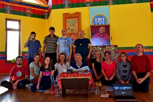 group photo of participants at the retreat with Elio Guarisco