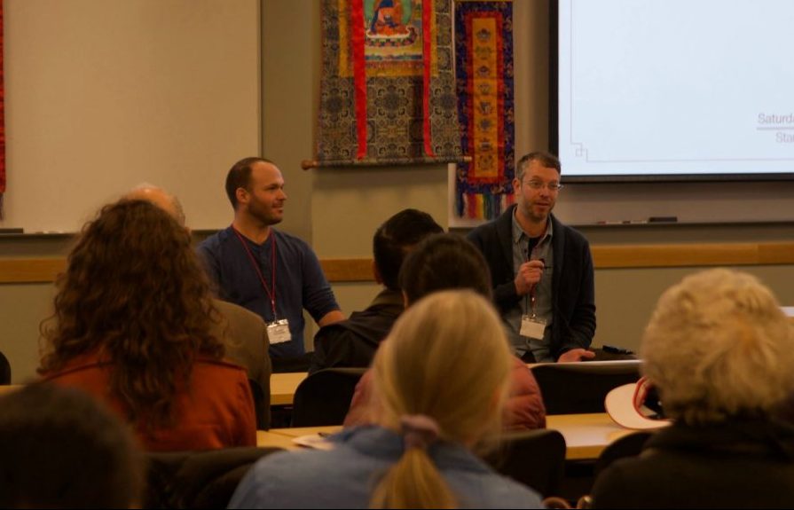 Matt Schmookler (left) and Luke Karamol presenting Yantra Yoga at the conference
