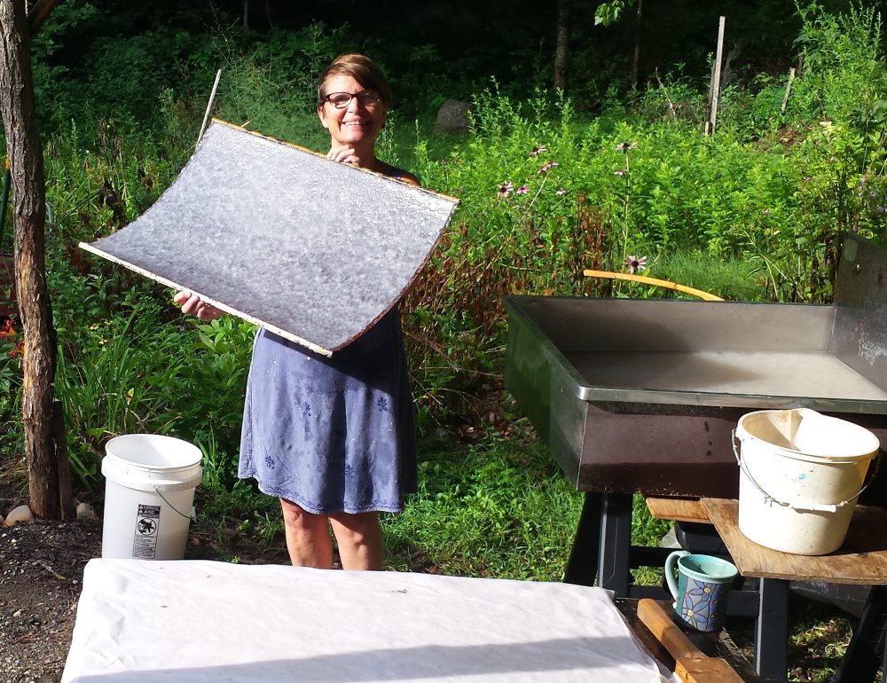 Sheryl makes paper and teaches paper making on lower Khandroling